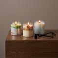 Load image into Gallery viewer, 3 candles staged ontop of a wood dresser with a wicker and snuffer in front 
